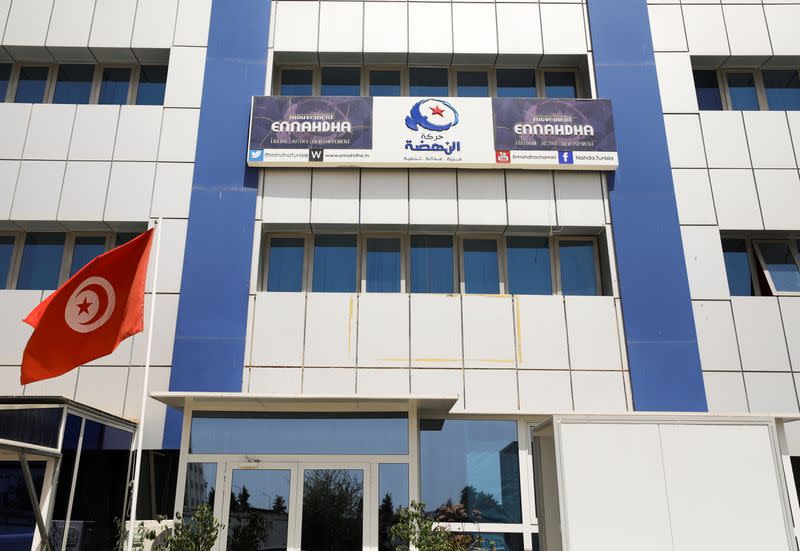 A tunisian flag flutters outside the building of the moderate Islamist Ennahda party headquarters in Tunis