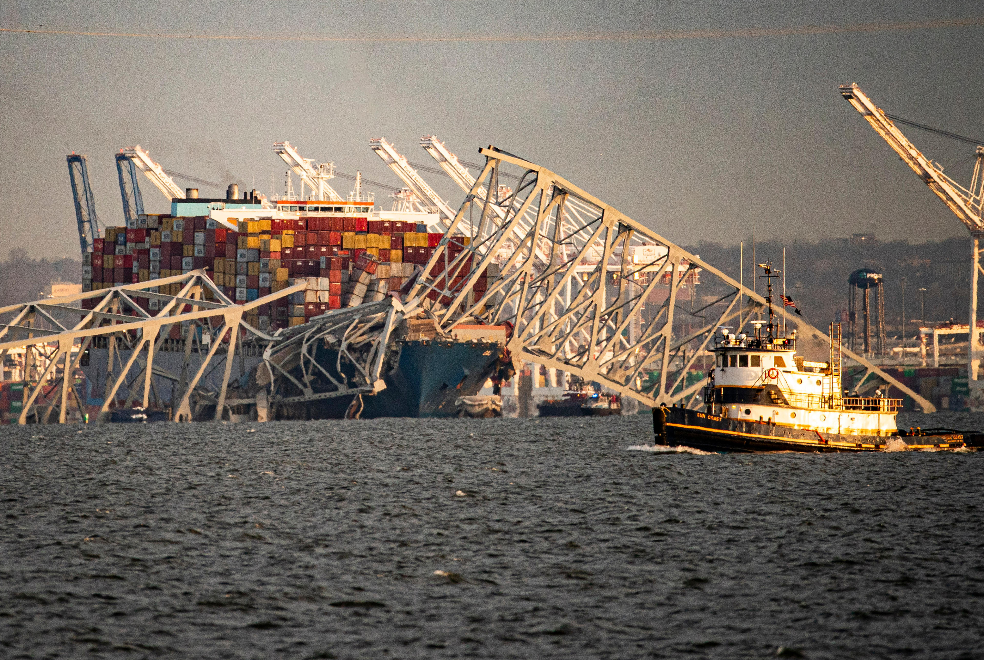 The Dali container vessel after striking the Francis Scott Key Bridge that collapsed into the Patapsco River in Baltimore, Maryland, US, on Tuesday, March 26, 2024. The commuter bridge collapsed after being rammed by the Dali ship, causing vehicles to plunge into the water. (Al Drago/Bloomberg via Getty Images)