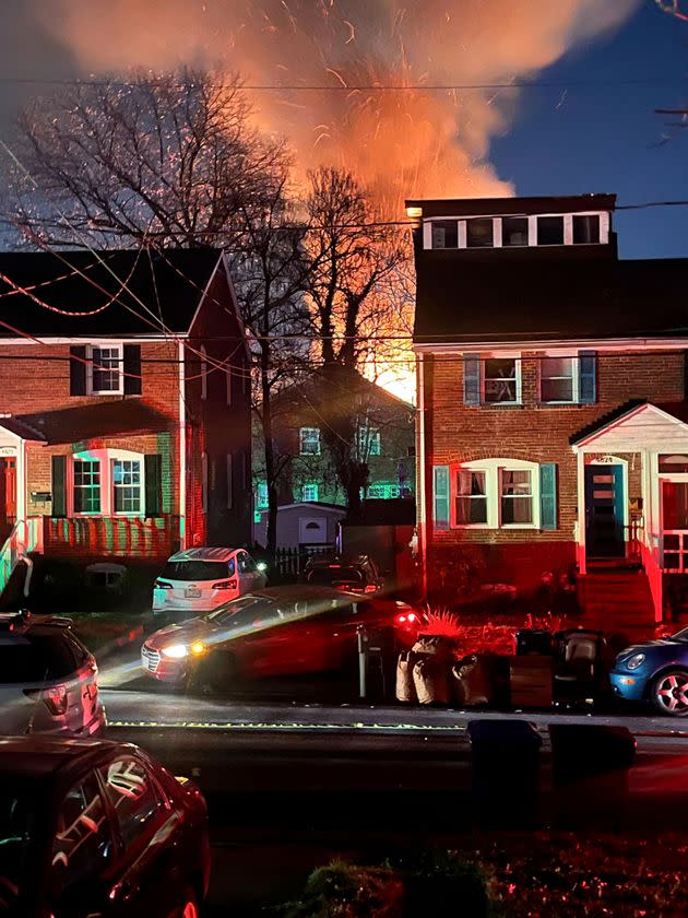 Smoke and flames are seen from an exploding home in Arlington, Virginia, Dec. 4, 2023.