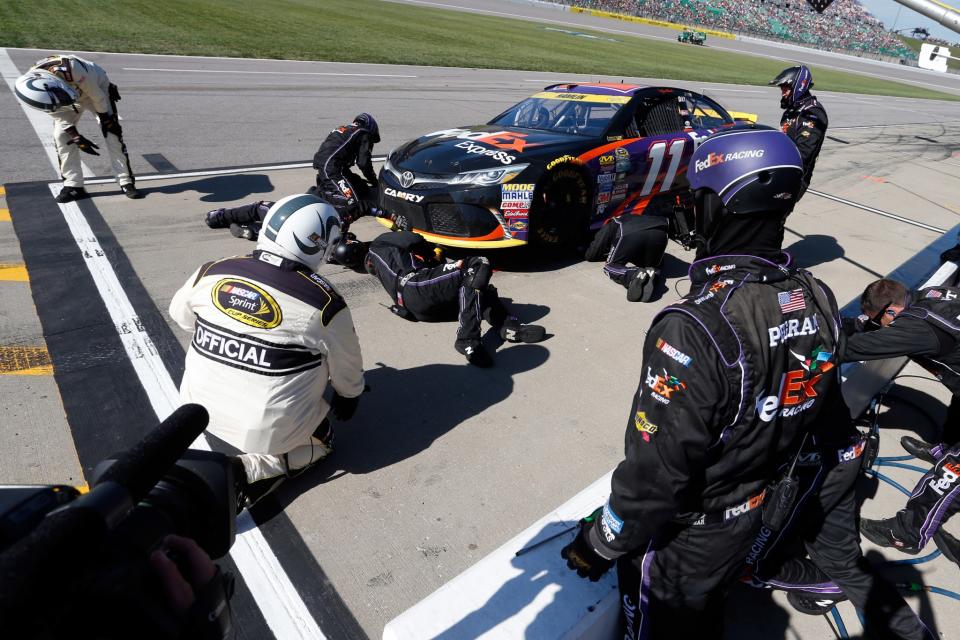 Denny Hamlin's car apparently hit something early in the race to break the splitter. (Getty)