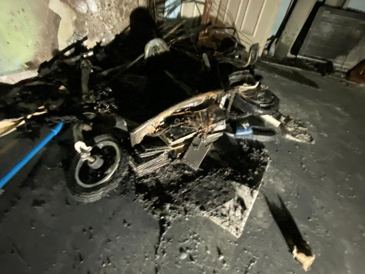 A burnt PMD seen at a fourth-floor unit at Block 111 Rivervale Walk on 10 March, 2020. (PHOTO: SCDF)