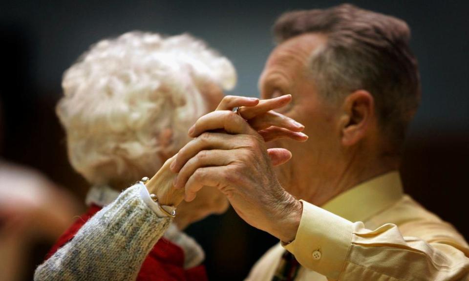 Older people take part in a tea dance.