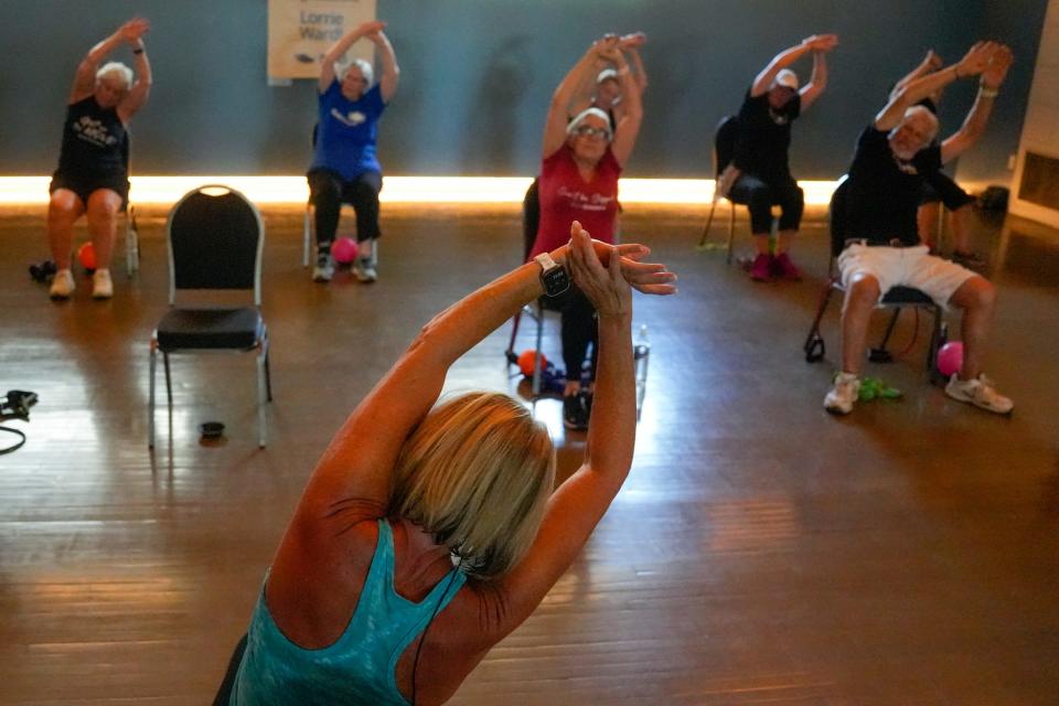 Lorrie Ward teaches a SilverSneakers Stability class in Phoenix on July 12, 2022. The class is designated to decrease risk of falls for participants 65 years and older.