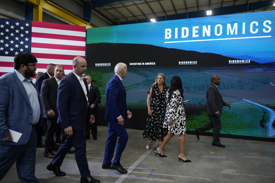 FILE - President Joe Biden, fourth form right, looks to Annie Tomasini, White House senior adviser and director of Oval Office Operations, third from right, as they leave Arcosa Wind Towers, Aug. 9, 2023, in Belen, N.M. Biden has chosen Tomasini to be a White House deputy chief of staff. (AP Photo/Alex Brandon, File)