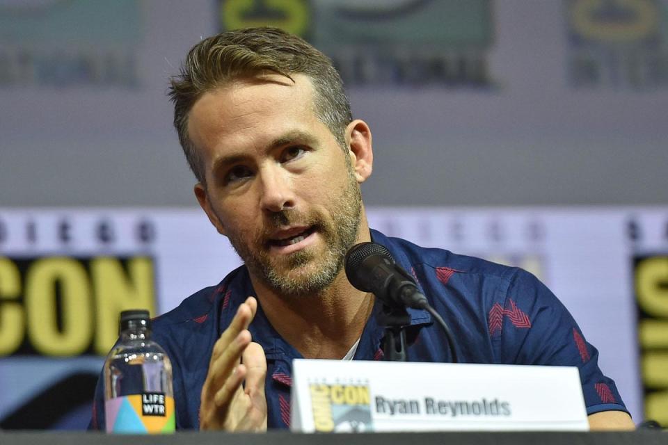 Ryan Reynolds addresses the crowd at Comic Con, in San Diego, California (Chris Delmas / AFP / Getty Images)