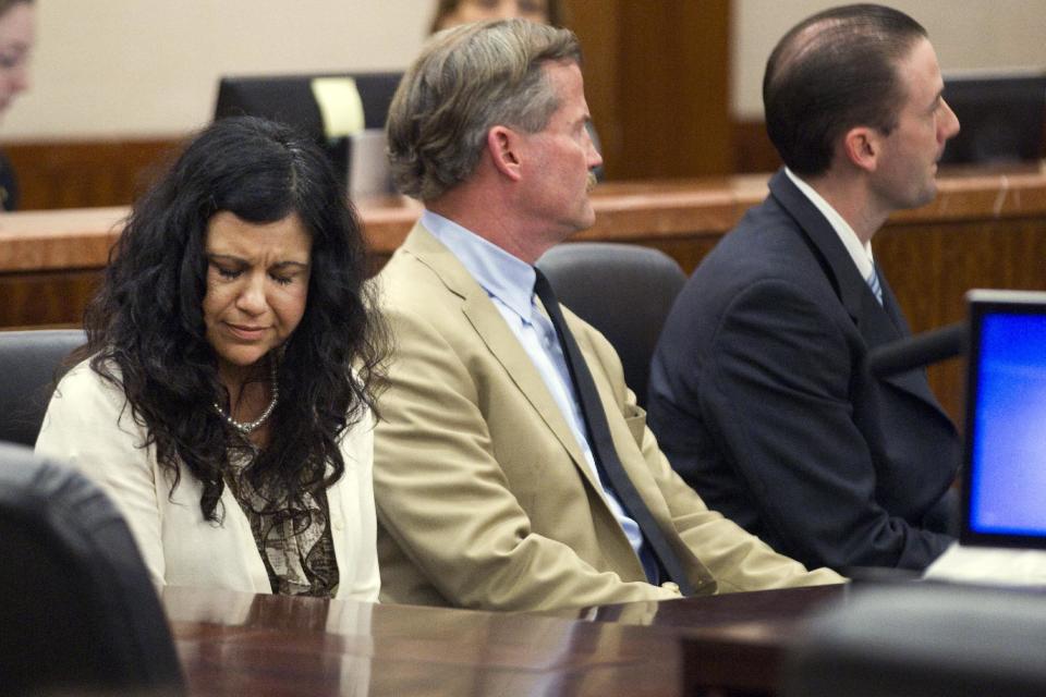 Ana Trujillo reacts after being found guilty of killing her boyfriend, after the jury deliberated less than two hours, on Tuesday, April 8, 2014, in Houston. Trujillo, 45, was found guilty of fatally stabbing her boyfriend with the stiletto heel of her shoe, hitting him at least 25 times in the face. (AP Photo/Houston Chronicle, Brett Coomer)