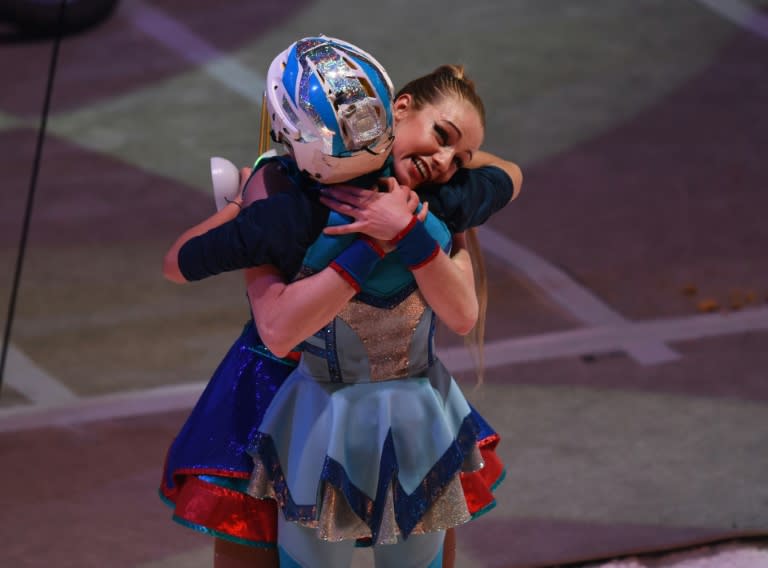 Performers embrace at the end of the last ever show from the Ringling Bros. and Barnum & Bailey circus in Uniondale, New York, on May 21, 2017