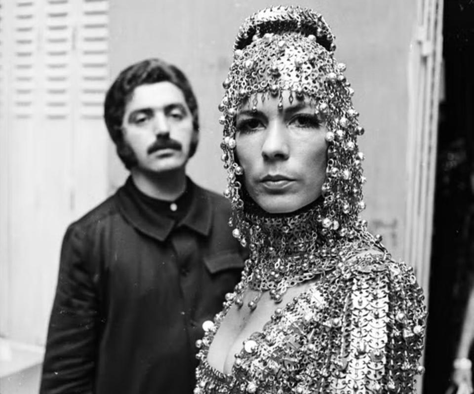 Rabanne with model Isabel Feldel, who is wearing one of his elaborate metallic creations, in 1967 (Getty)