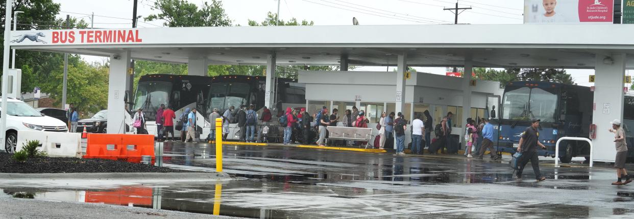 People wait on a rainy afternoon for their rides at the new bus station serving Greyhound, Barons, and other bus lines at 845 N. Wilson Road on the West Side. After years of being in Downtown, the bus station has moved to this location, but critics are venting about crime, nuisance and traffic of the new bus depot. They also say it's just too close to their residential homes.