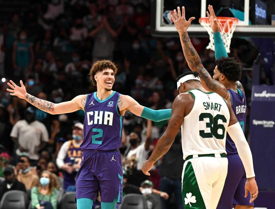 In his second year, Charlotte Hornets guard LaMelo Ball (2) and forward Miles Bridges (right, with hands up) have formed one of the NBA’s top tandems.