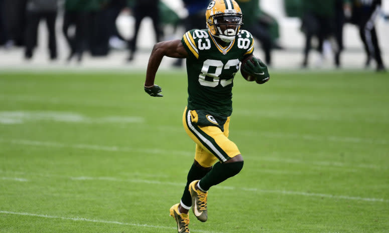 Marquez Valdes-Scantling #83 of the Green Bay Packers runs for yards during a game
