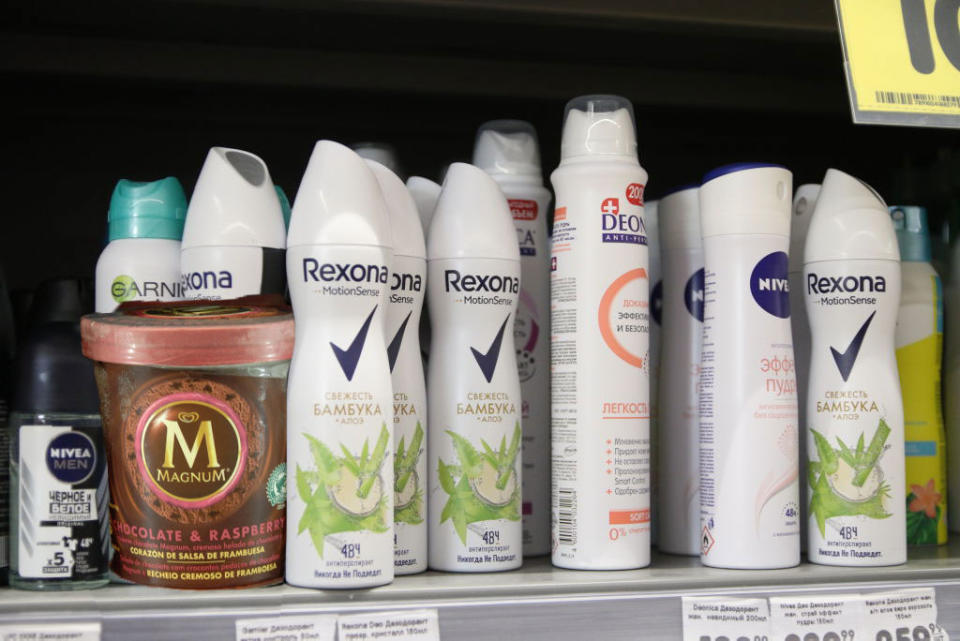 A pint of ice cream among deodorants on a shelf