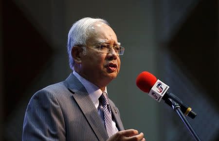 Malaysia's Prime Minister Najib Razak announces revisions to the fiscal budget in Putrajaya, Malaysia, January 28, 2016. REUTERS/Olivia Harris