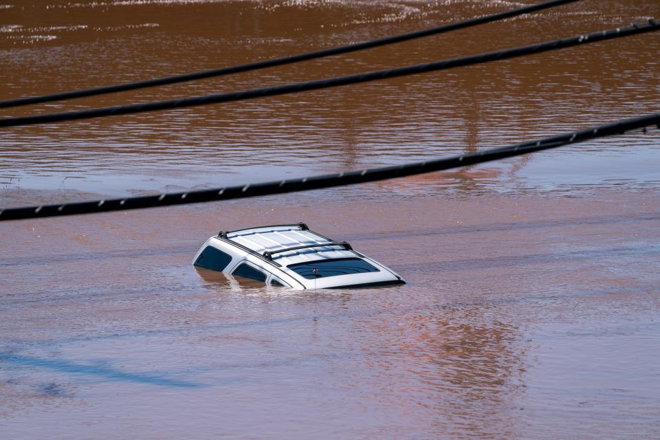 Car is submerged in flood waters from Ida outside TD Bank Ballpark in Bridgewater.