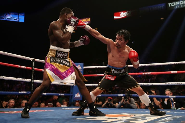 Pacquiao (R) easily won with an impressive display of superior hand speed and destructive power that landed him a unanimous decision victory over the much younger American at the MGM Grand Hotel in Las Vegas