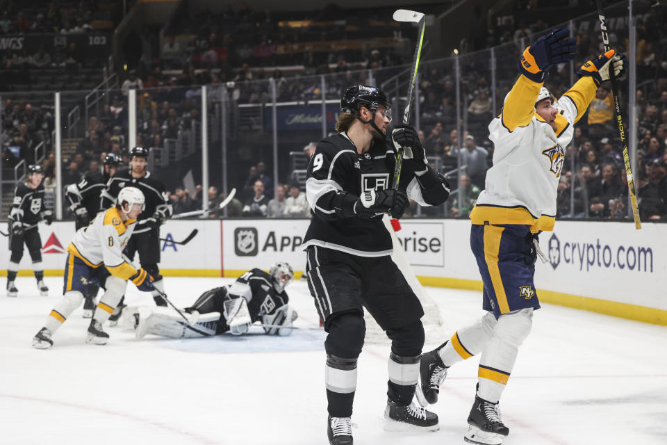 Nashville Predators center Yakov Trenin, right, celebrates after scoring against the Los Angeles Kings during the first period of an NHL hockey game Thursday, Feb. 22, 2024, in Los Angeles. (AP Photo/Yannick Peterhans)
