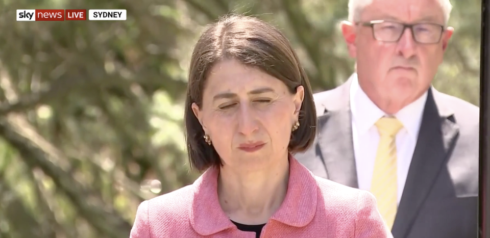 Pictured is Gladys Berejiklian blinking during a press conference. 