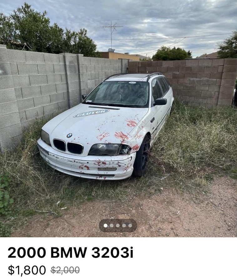 bmw with bloody hand prints all along the front