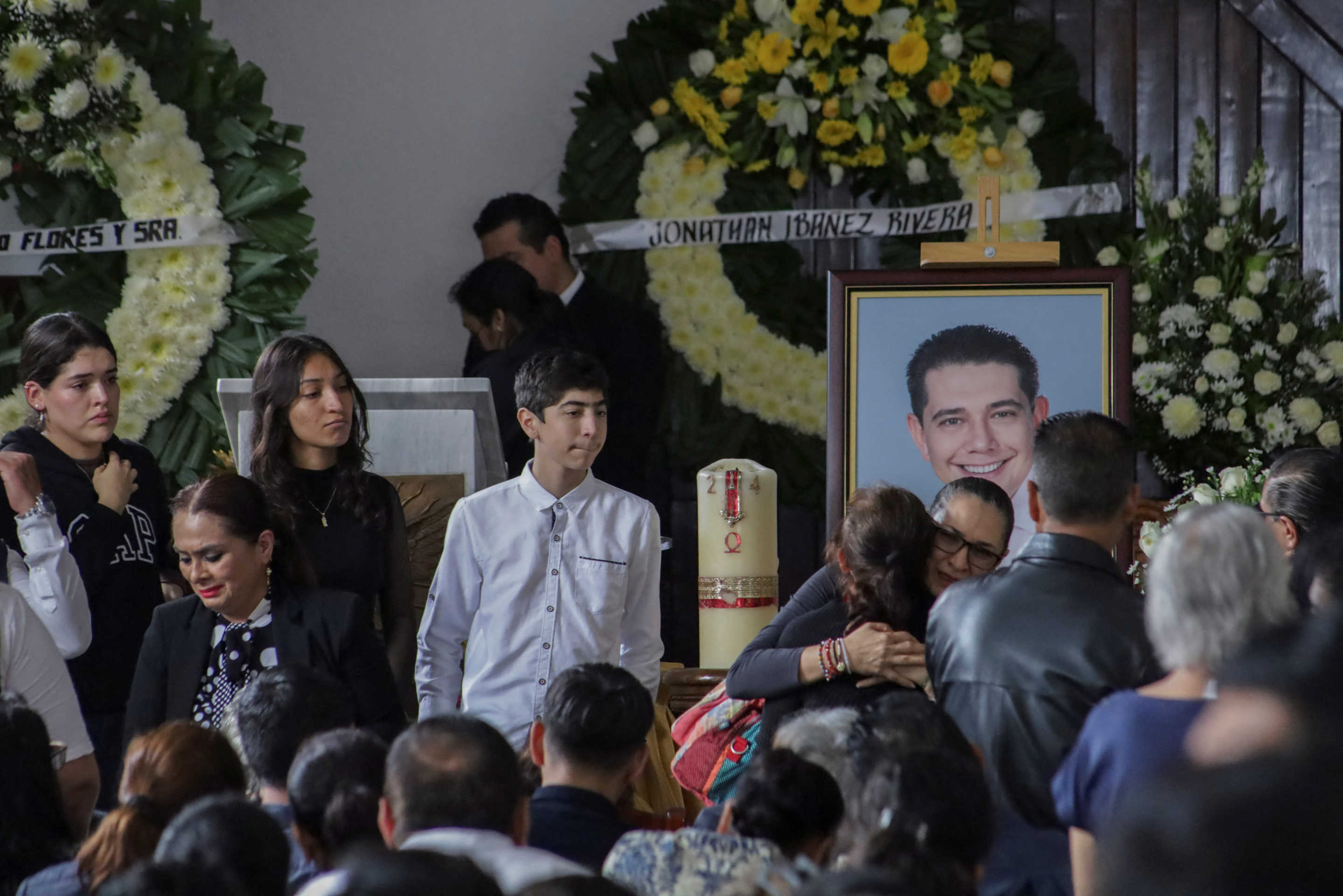 A portrait of Alejandro Arcos, the mayor of Chilpancingo who was killed on Sunday less than a week after taking office, is shown at his funeral service as Mexico's President Claudia Sheinbaum is set to unveil a new security policy, in Chilpancingo, Mexico October 7, 2024. REUTERS/Oscar Ramirez