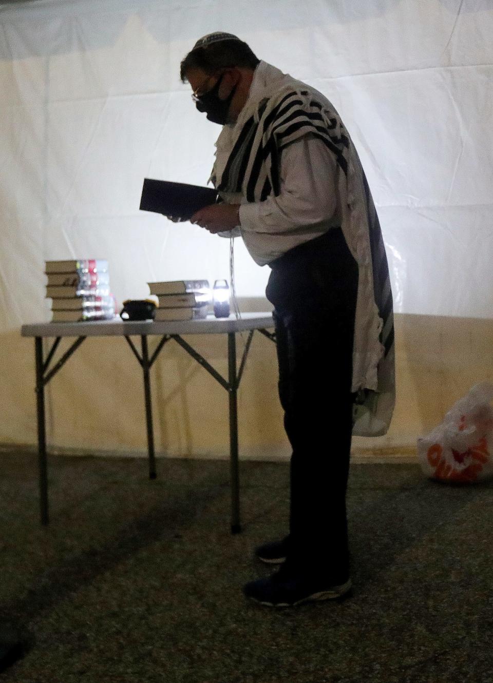 Rabbi Asher Lopatin leader of Kehillat Etz Chayim shared prayers during a religious service at night, Selichot, which is often done in preparation for the Jewish high holidays Saturday, September 12, 2020 at Congregation Beth, Shalom in Oak Park. 