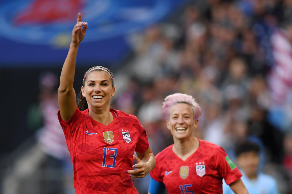 REIMS, FRANCE - JUNE 11: Alex Morgan of the USA celebrates after scoring her team's first goal during the 2019 FIFA Women's World Cup France group F match between USA and Thailand at Stade Auguste Delaune on June 11, 2019 in Reims, France. (Photo by Alex Caparros - FIFA/FIFA via Getty Images)