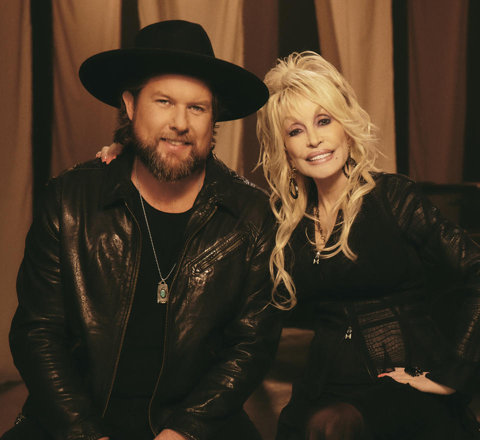 Zach Williams and Dolly Parton on set of the 