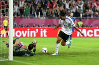 GDANSK, POLAND - JUNE 22: Sami Khedira of Germany celebrates scoring their second goal during the UEFA EURO 2012 quarter final match between Germany and Greece at The Municipal Stadium on June 22, 2012 in Gdansk, Poland. (Photo by Joern Pollex/Getty Images)