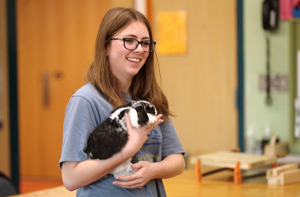 Alivia Vandergrift with the class rabbit, Violet, helps care for many of the animals as part of the agriculture class at Marion Jr. Sr High School.