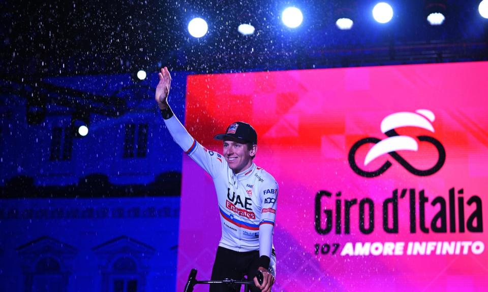 <span>Tadej Pogacar hails the crowds at a glitzy team presentation for the Giro d'Italia this week.</span><span>Photograph: Dario Belingheri/Getty Images</span>