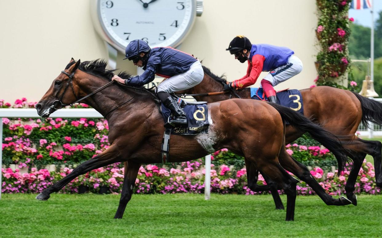 Jockey Ryan Moore riding Russian Emperor (left) - AFP