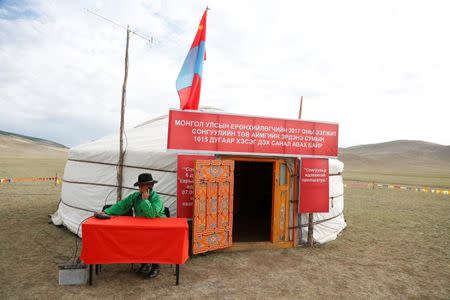 An election official waits for voters in country's presidential elections at a polling station in Erdensom Country, Tuv Province, Mongolia June 26, 2017. REUTERS/B. Rentsendorj