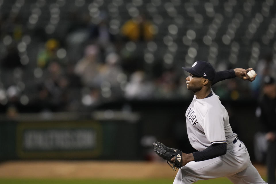 New York Yankees' Domingo Germán pitches against the Oakland Athletics during the seventh inning of a baseball game in Oakland, Calif., Wednesday, June 28, 2023. (AP Photo/Godofredo A. Vásquez)