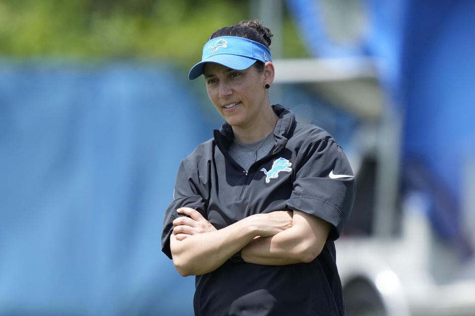 Detroit Lions Director of Sports Medicine Jill Costanza watches an NFL football practice, Tuesday, June 4, 2024, in Allen Park, Mich. Costanza’s interest in studying ACL injuries and passion for learning new ways to improve performance led the former high school basketball coach and PE teacher on a journey from college sports to the Army to the Air Force to the NFL. Now, she’s an asset for a team with Super Bowl aspirations. (AP Photo/Carlos Osorio)