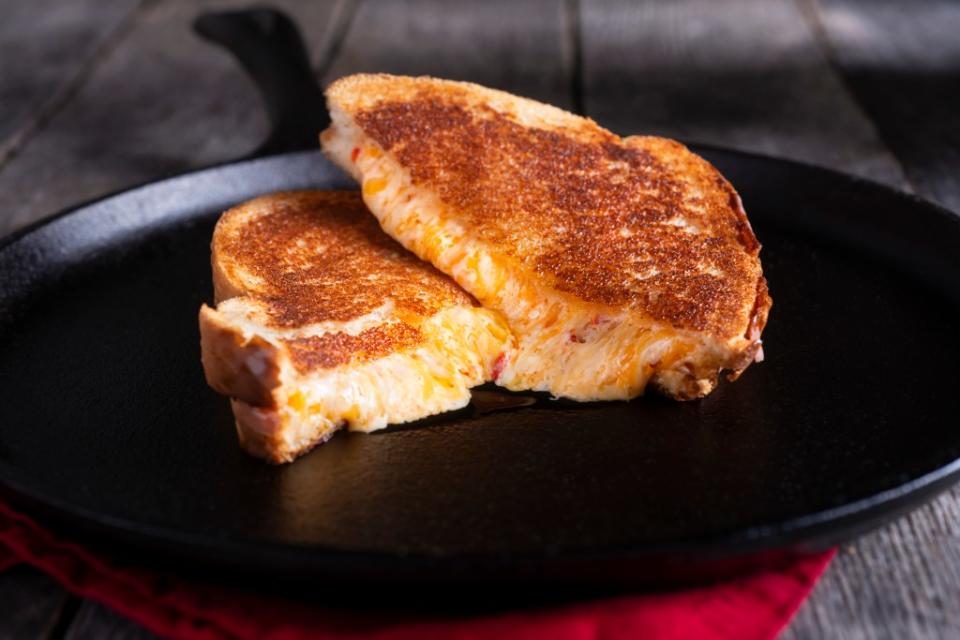 Grilled cheese sandwiches were found to be best for quick and easy weekday meals (53%), during cravings (38%) and on rainy days (27%). Getty Images