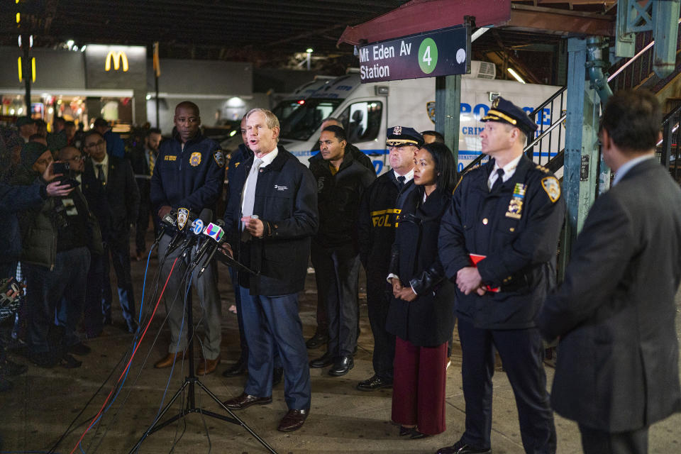 Metropolitan Transit Authority CEO Janno Lieber, center left, speaks to the media after a shooting at the Mount Eden Avenue subway station, Monday, Feb. 12, 2024, in the Bronx borough of New York. (AP Photo/Eduardo Munoz Alvarez)