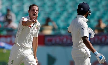 Cricket - India v Australia - Fourth Test cricket match - Himachal Pradesh Cricket Association Stadium, Dharamsala, India - 26/03/17 - Australia's Josh Hazlewood celebrates after dismissing India's Murali Vijay. REUTERS/Adnan Abidi