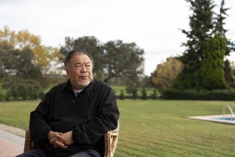 Dissident Chinese artist and activist Ai Weiwei pauses during an interview at his country house in Montemor-o-Novo, Portugal, Tuesday, Dec. 6, 2022. Ai is taking heart from recent public protests in China over the authorities' strict COVID-19 policy, but he doesn't see them bringing about any significant political change. (AP Photo/Ana Brigida)