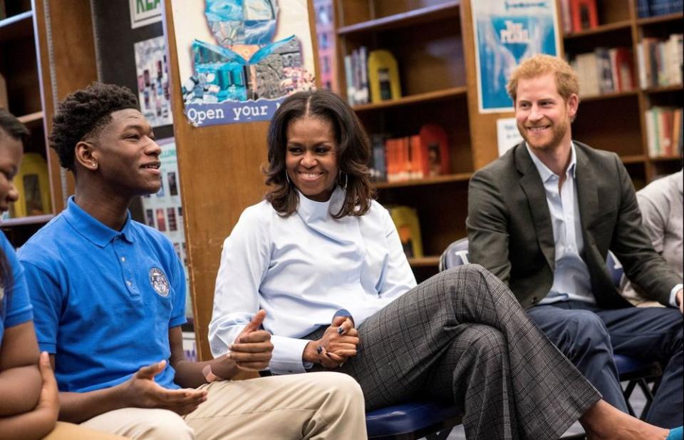 Michelle Obama and Prince Harry speak to students at Hyde Park Academy in Chicago, Ill.