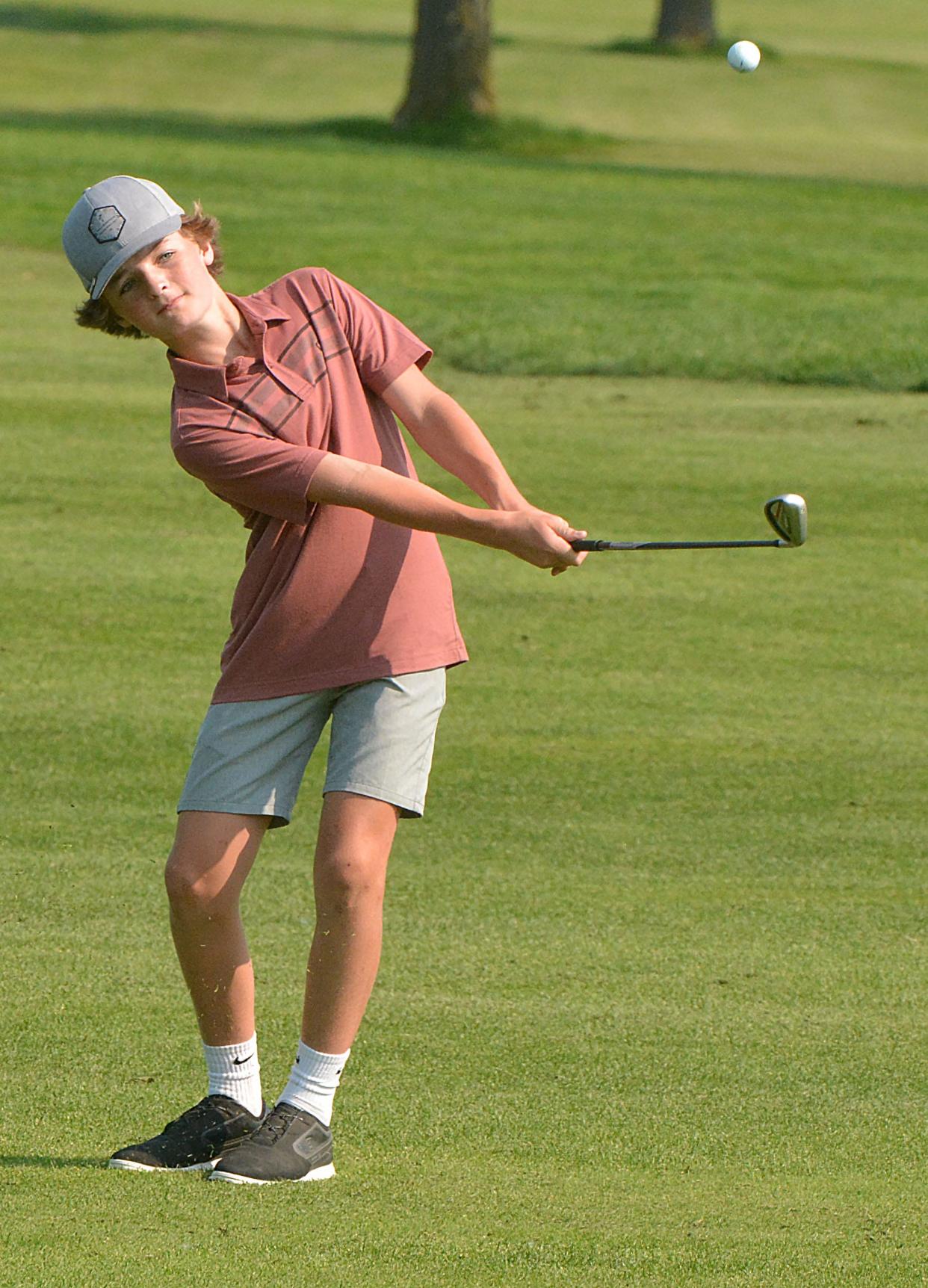 Riley Randall of Watertown (12-13 boys) hits to the No. 1 Red green during the South Dakota Golf Association Junior Tour stop on Tuesday, July 9, 2024 at Cattail Crossing Golf Course in Watertown.