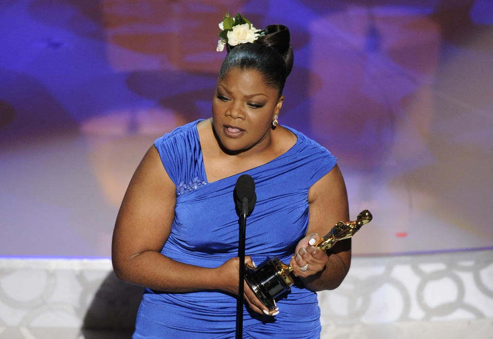 Mo'Nique accepts the Oscar for best performance by an actress in a supporting role for “Precious: Based on the Novel 'Push' by Sapphire” at the 82nd Academy Awards Sunday, March 7, 2010, in the Hollywood section of Los Angeles. (AP Photo/Mark J. Terrill)