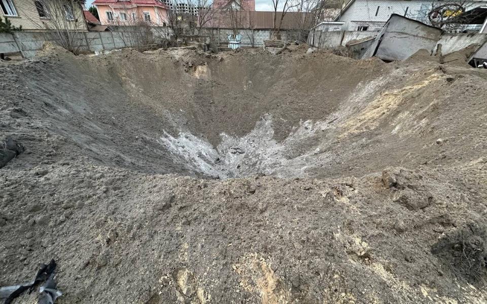 A large crater in Kyiv's Darnytskyi district