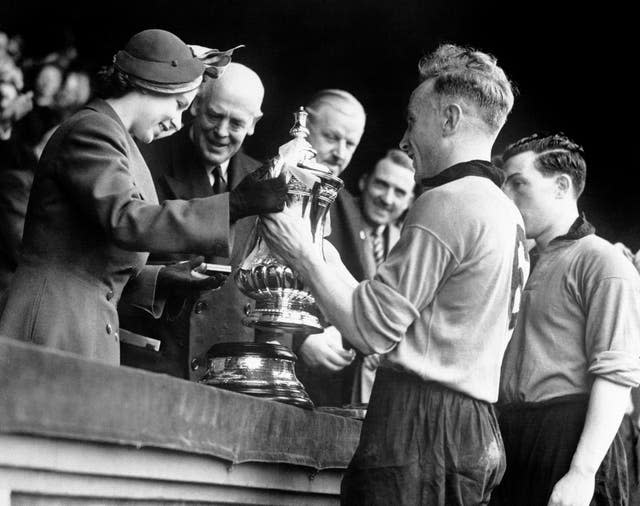 In 1949, before becoming Queen, then Princess Elizabeth presented the FA Cup to Wolves captain Billy Wright