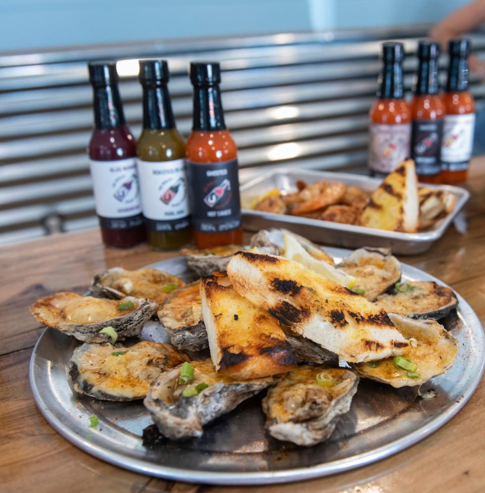 The chard-grilled Parmesan and Garlic oysters are one of the more popular items on the menu of the Salty Pearl, one of  Perdido Key's newest restaurants.