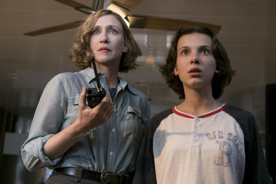 This image released by Warner Bros. Pictures shows Vera Farmiga, left, and Millie Bobby Brown in a scene from "Godzilla: King of the Monsters." (Daniel McFadden/Warner Bros. Pictures via AP)