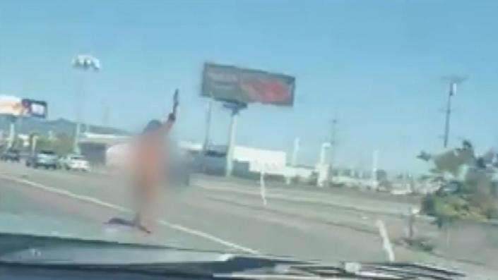 Naked woman with gun at eastbound Bay Bridge approach. / Credit: CBS SF