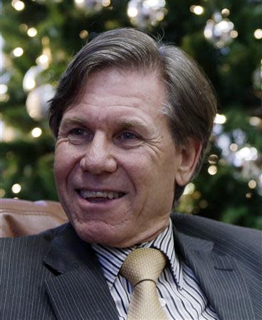 Chief Judge Randall Rader of the United States Court of Appeals for the Federal Circuit is seen in his chambers in Washington December 3, 2013. REUTERS/Gary Cameron