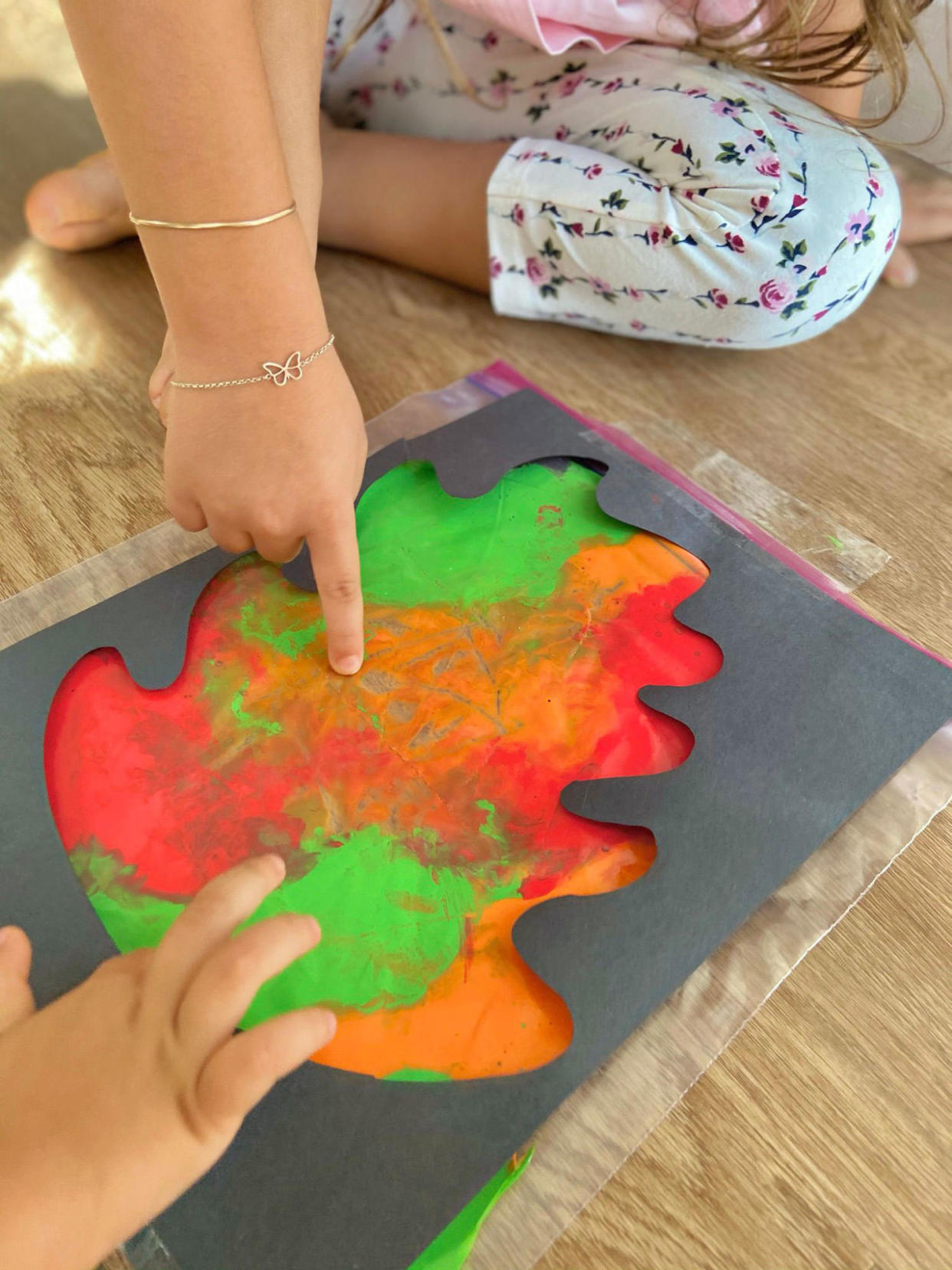 child's art project with leaves (Courtesy Stephanie Pflucker and Katrina Suarez)