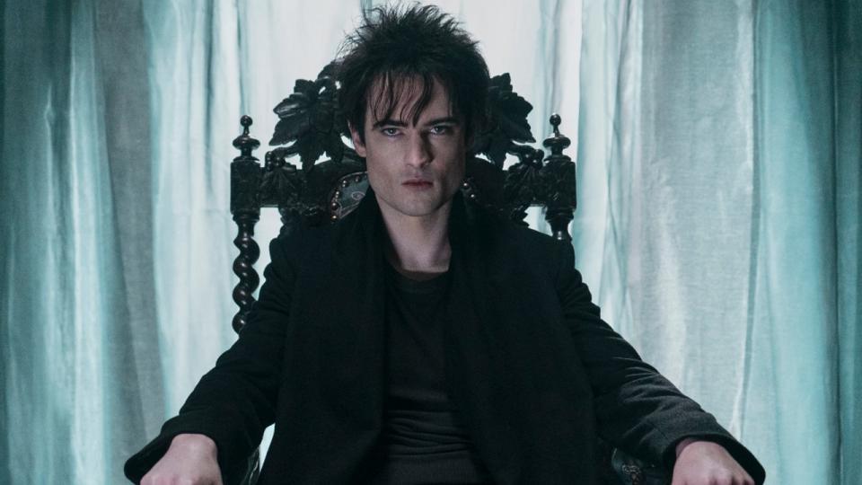 Tom Sturridge as Dream sitting in a throne on The Sandman