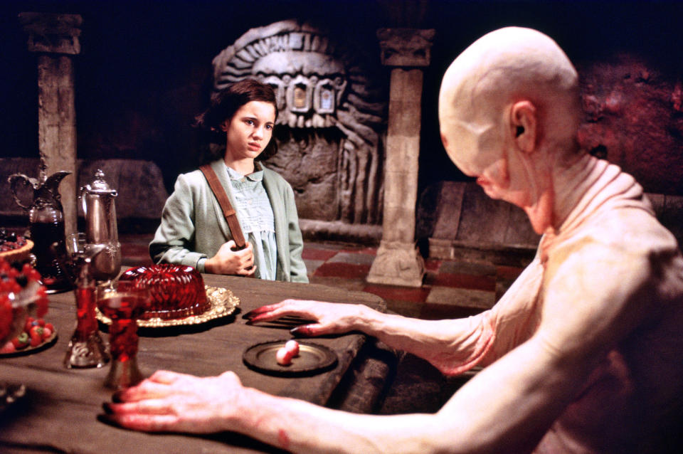 FILE - In this undated file photo originally released by Picturehouse, Ivana Baquero, left, and Doug Jones are shown in a scene from the film, "Pan's Labyrinth." (AP Photo/Picturehouse, Teresa Isasi, file)
