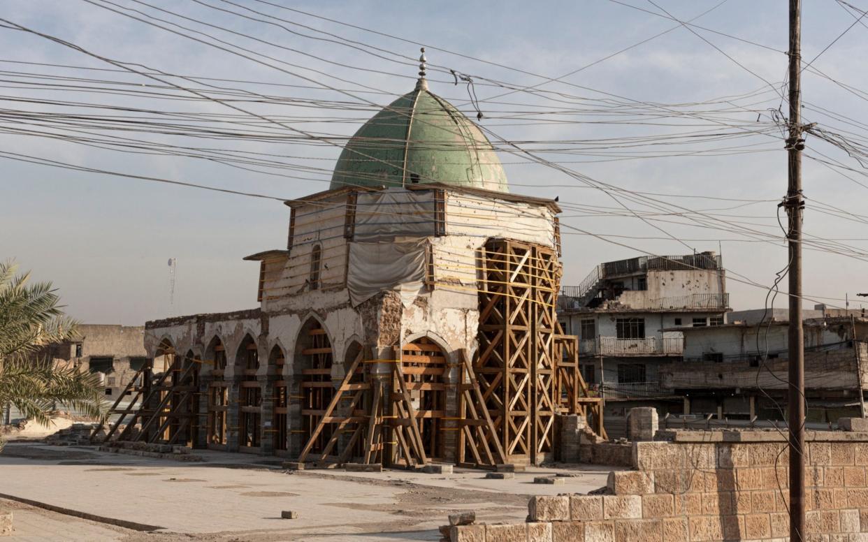 A soldier stands in the courtyard of the historic Al Nuri mosque, in the Old City of Mosul, Iraq - Sam Tarling for The Telegraph